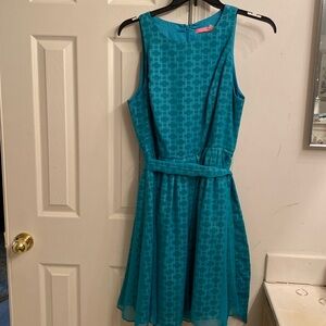 Beautiful teal blue dress with sash.